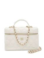 quilted leather top-handle vanity bag